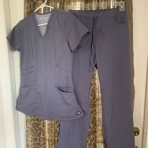 BNWOT Grey’s Anatomy scrubs XS tops and XST bottoms. Never worn!